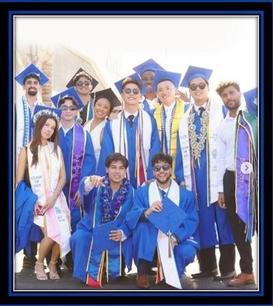 A picture of 12 college graduates